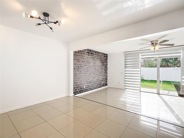 709 Orchid Dr, Davenport, FL 33897 - spare room with tile patterned flooring, ceiling fan, and a chandelier