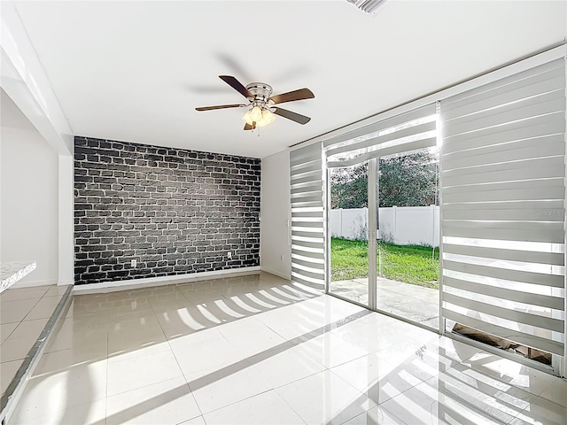 709 Orchid Dr, Davenport, FL 33897 - tiled spare room with a ceiling fan