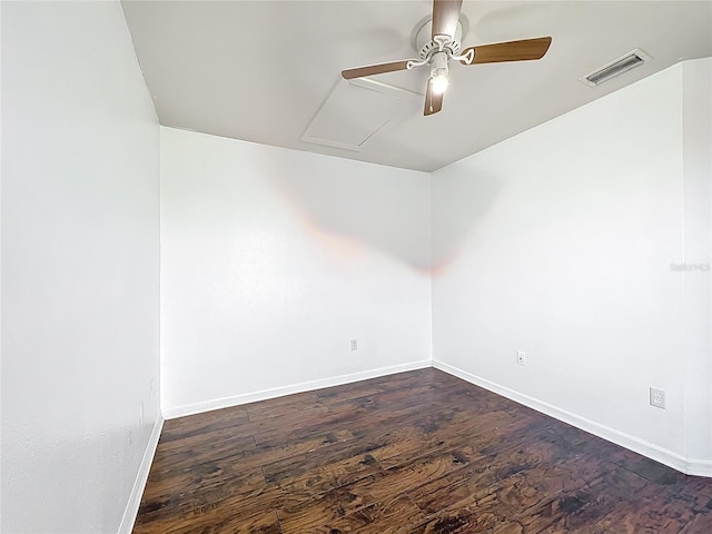 709 Orchid Dr, Davenport, FL 33897 - empty room with a ceiling fan, wood finished floors, and attic access