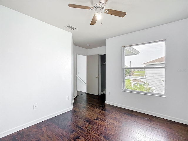 709 Orchid Dr, Davenport, FL 33897 - spare room featuring wood finished floors and ceiling fan