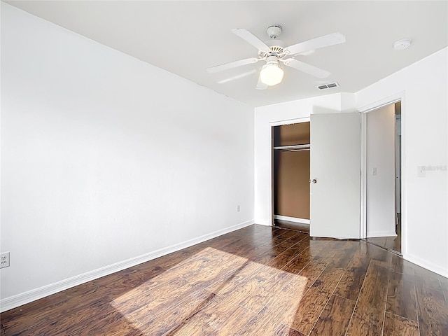 709 Orchid Dr, Davenport, FL 33897 - unfurnished bedroom featuring wood finished floors, a closet, and a ceiling fan