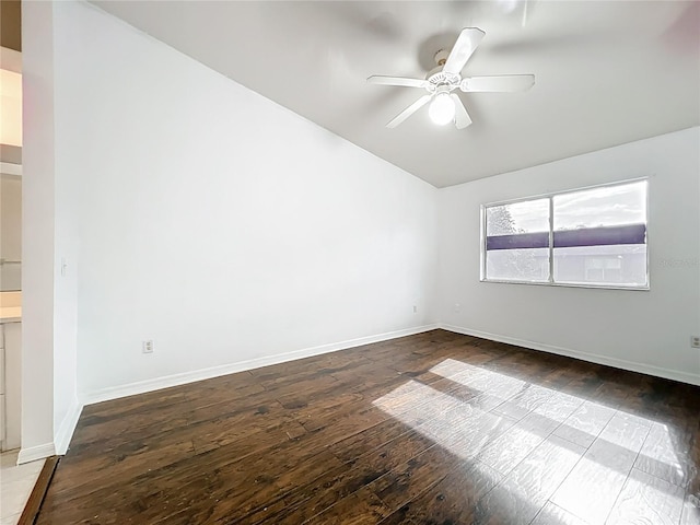 709 Orchid Dr, Davenport, FL 33897 - empty room featuring vaulted ceiling, hardwood / wood-style floors, and a ceiling fan