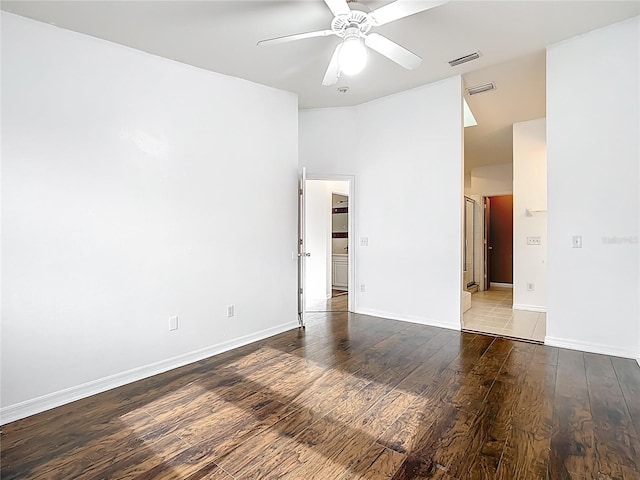 709 Orchid Dr, Davenport, FL 33897 - spare room with wood finished floors and ceiling fan