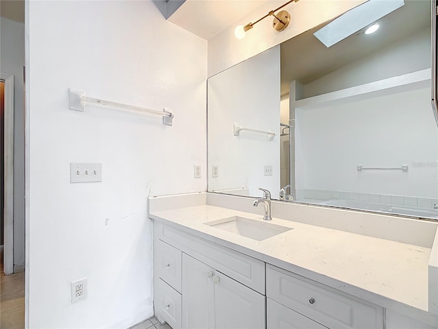 709 Orchid Dr, Davenport, FL 33897 - bathroom with vanity and tile patterned flooring
