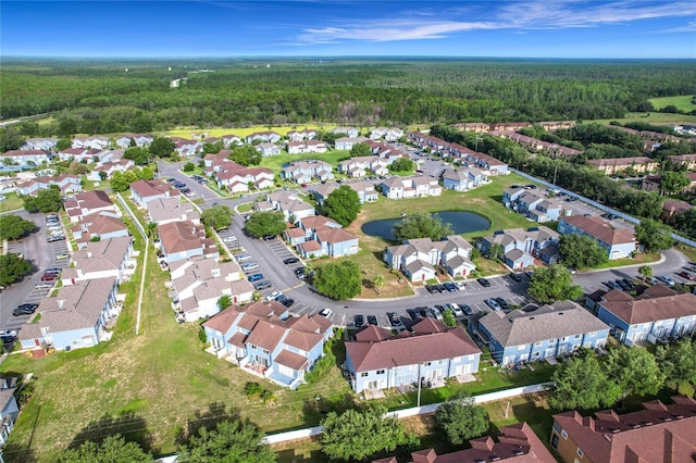 709 Orchid Dr, Davenport, FL 33897 - aerial view of property and surrounding area with a forest and nearby suburban area