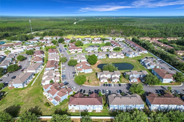 709 Orchid Dr, Davenport, FL 33897 - aerial overview of property's location with a forest and nearby suburban area