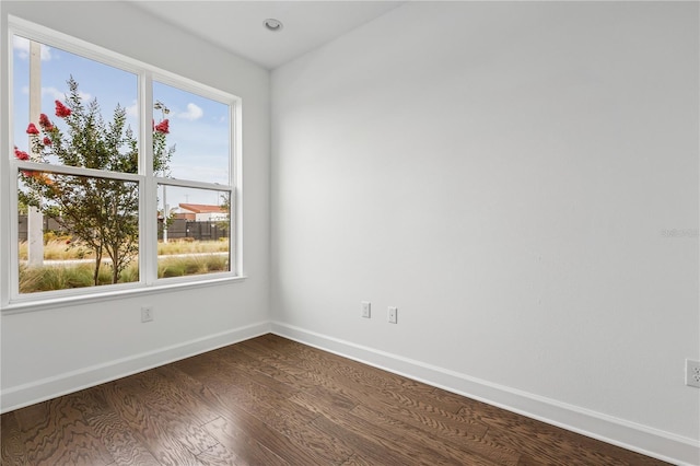 2018 Packing District Way, Orlando, FL 32804 - spare room with dark wood finished floors and healthy amount of natural light