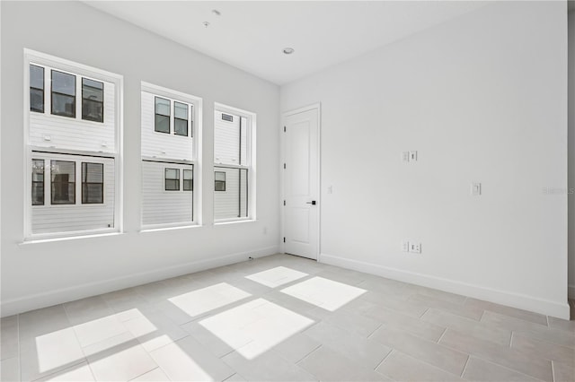 2018 Packing District Way, Orlando, FL 32804 - unfurnished room featuring baseboards