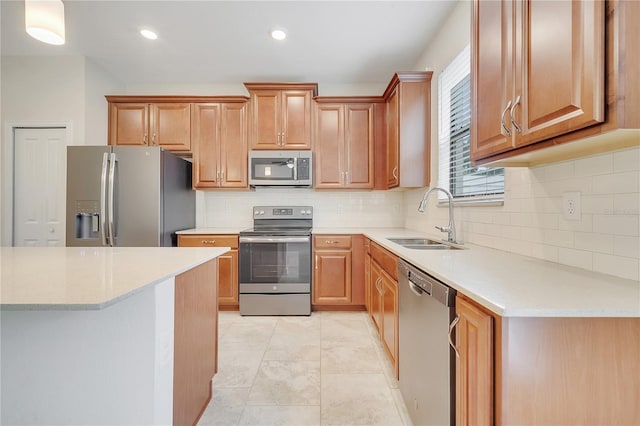1246 Payne Stewart Dr, Davenport, FL 33896 - kitchen featuring stainless steel appliances, tasteful backsplash, and recessed lighting