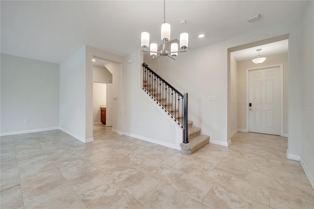 1246 Payne Stewart Dr, Davenport, FL 33896 - foyer entrance featuring stairway and a chandelier