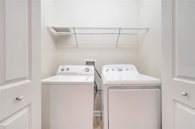 1246 Payne Stewart Dr, Davenport, FL 33896 - laundry room featuring washing machine and clothes dryer