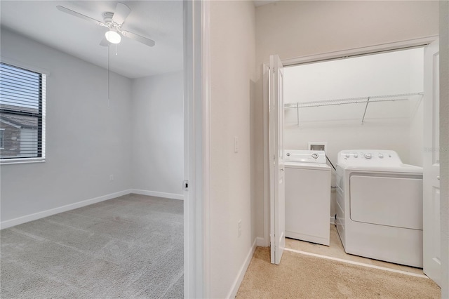 1246 Payne Stewart Dr, Davenport, FL 33896 - laundry area with washer and dryer, light carpet, and a ceiling fan
