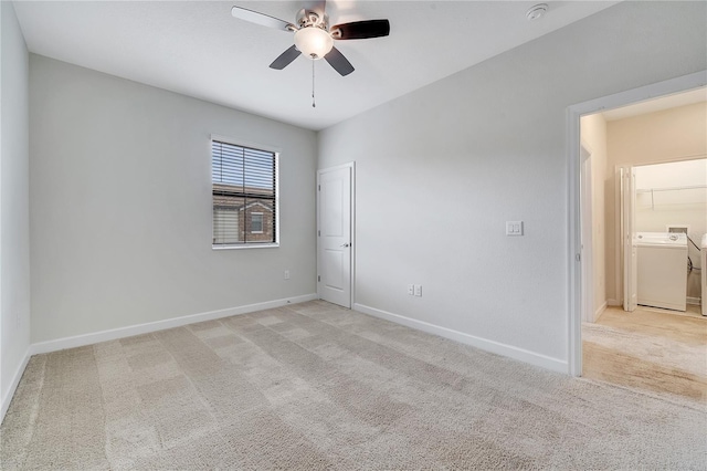 1246 Payne Stewart Dr, Davenport, FL 33896 - empty room featuring washer / dryer, light carpet, a ceiling fan, and a smoke detector
