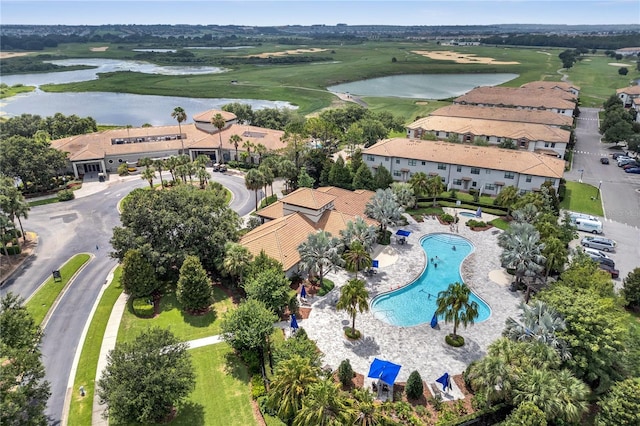 1246 Payne Stewart Dr, Davenport, FL 33896 - drone / aerial view of a nearby body of water and a golf course