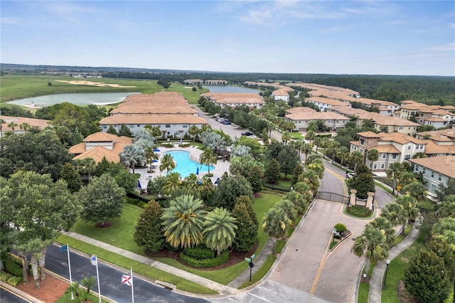 1246 Payne Stewart Dr, Davenport, FL 33896 - bird's eye view of a nearby body of water and a pool