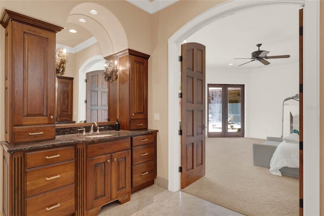 3130 Butler Bay Dr N, Windermere, FL 34786 - bathroom with a ceiling fan, vanity, crown molding, and recessed lighting