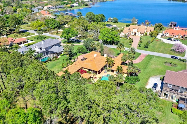 3130 Butler Bay Dr N, Windermere, FL 34786 - aerial perspective of suburban area with a large body of water