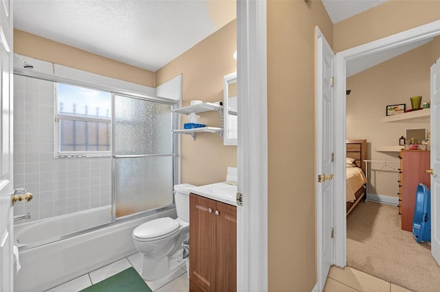 1803 Tillstream Dr, Orlando, FL 32818 - ensuite bathroom featuring tile patterned flooring, vanity, combined bath / shower with glass door, and plenty of natural light