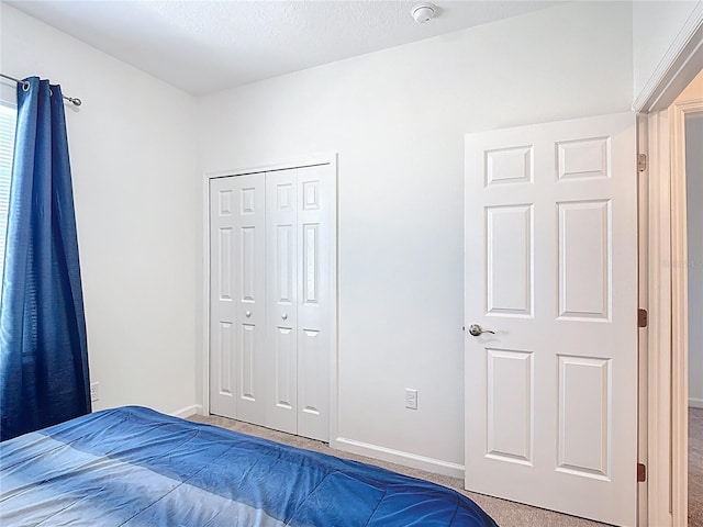 129 Boydfield Ln, Davenport, FL 33837 - unfurnished bedroom featuring light carpet and a closet