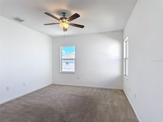 129 Boydfield Ln, Davenport, FL 33837 - carpeted spare room with ceiling fan and baseboards