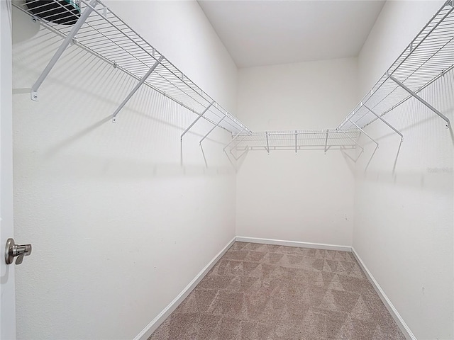 129 Boydfield Ln, Davenport, FL 33837 - spacious closet featuring carpet flooring
