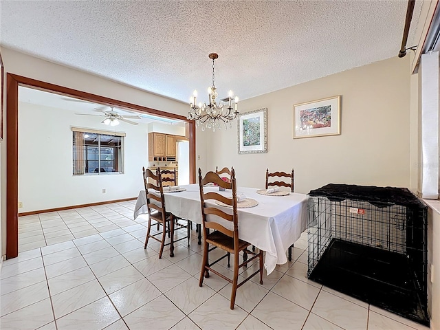 8346 Mattituck Cir, Orlando, FL 32829 - dining area with a chandelier, a textured ceiling, and light tile patterned flooring