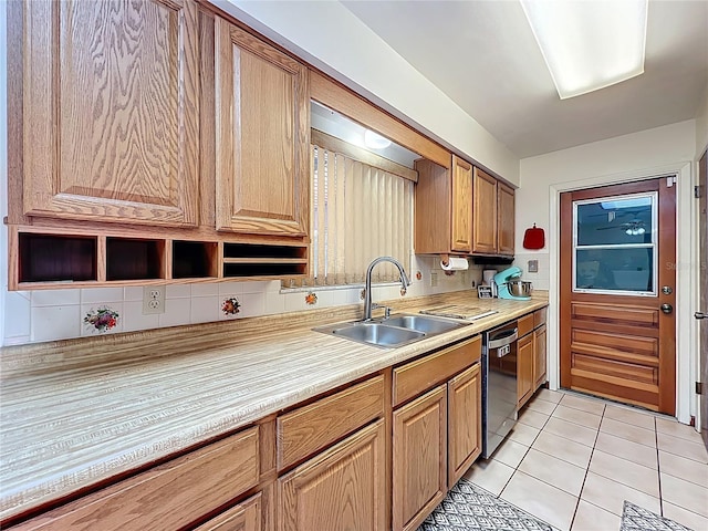 8346 Mattituck Cir, Orlando, FL 32829 - kitchen with dishwasher, light countertops, and light tile patterned floors