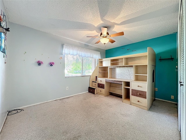 8346 Mattituck Cir, Orlando, FL 32829 - unfurnished bedroom with light colored carpet, a textured ceiling, and ceiling fan