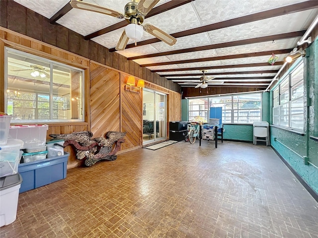 8346 Mattituck Cir, Orlando, FL 32829 - sunroom featuring a ceiling fan and beam ceiling
