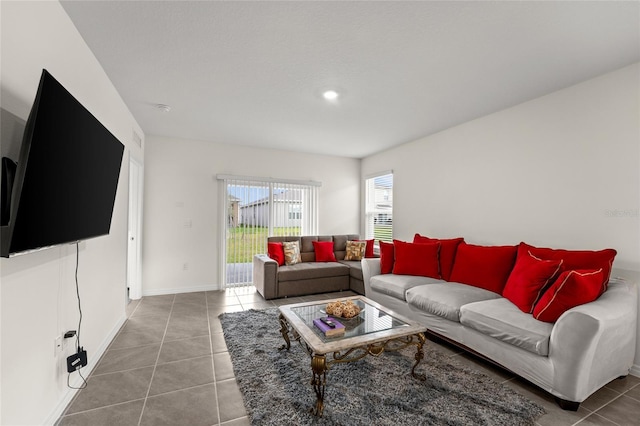 1792 Bull Hill Rd, Kissimmee, FL 34744 - tiled living area featuring baseboards