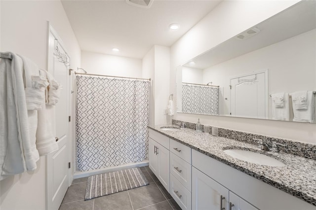 1792 Bull Hill Rd, Kissimmee, FL 34744 - bathroom featuring double vanity, tile patterned flooring, a shower with curtain, and recessed lighting