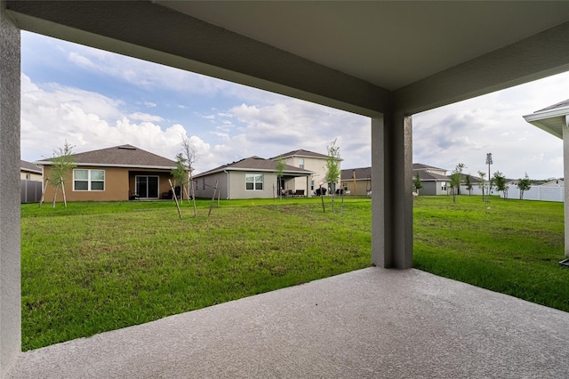 1792 Bull Hill Rd, Kissimmee, FL 34744 - view of grassy yard with a patio area