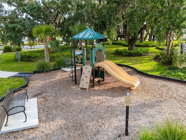 1792 Bull Hill Rd, Kissimmee, FL 34744 - communal playground with a lawn and view of scattered trees