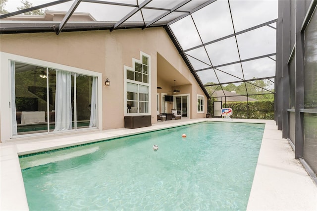 9285 Wickham Way, Orlando, FL 32836 - swimming pool featuring a patio, a ceiling fan, and a lanai