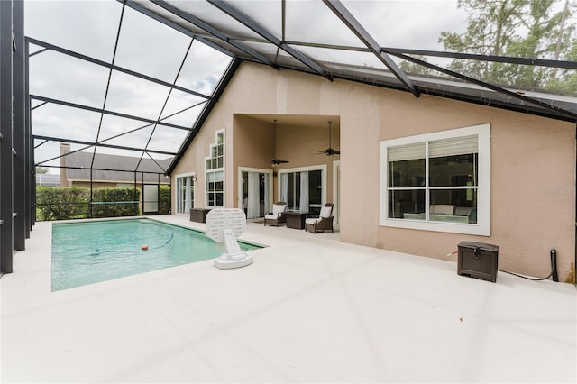 9285 Wickham Way, Orlando, FL 32836 - outdoor pool featuring a patio, a ceiling fan, outdoor lounge area, and a lanai