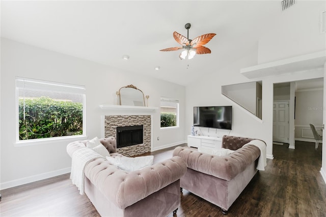 9285 Wickham Way, Orlando, FL 32836 - living room with a ceiling fan, dark wood-style floors, a fireplace, and high vaulted ceiling