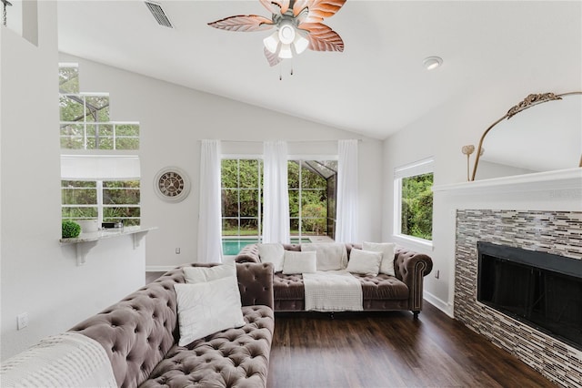 9285 Wickham Way, Orlando, FL 32836 - living room featuring ceiling fan, dark wood finished floors, a fireplace, and high vaulted ceiling