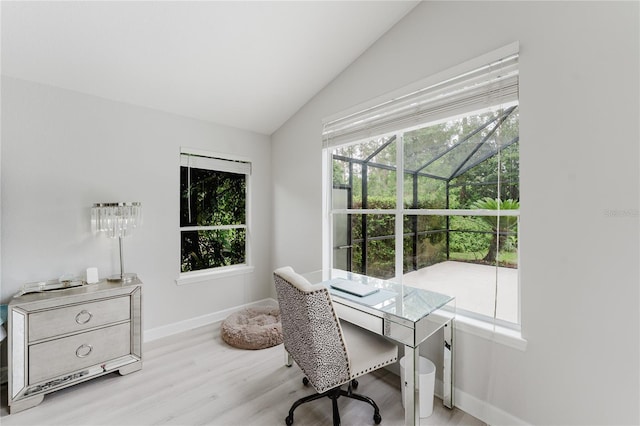9285 Wickham Way, Orlando, FL 32836 - office area with vaulted ceiling, healthy amount of natural light, and wood finished floors