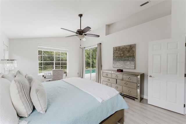 9285 Wickham Way, Orlando, FL 32836 - bedroom with access to outside, vaulted ceiling, light wood-type flooring, and ceiling fan