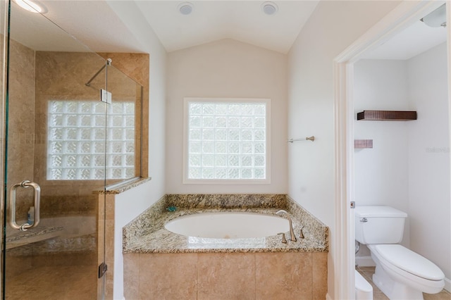 9285 Wickham Way, Orlando, FL 32836 - bathroom featuring a garden tub, a shower stall, and vaulted ceiling
