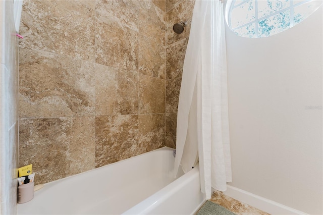 9285 Wickham Way, Orlando, FL 32836 - full bathroom featuring shower / bath combination with curtain and baseboards