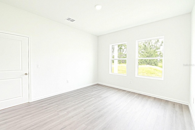 1309 Hillsborough Ln, Kissimmee, FL 34759 - empty room featuring wood finished floors and baseboards