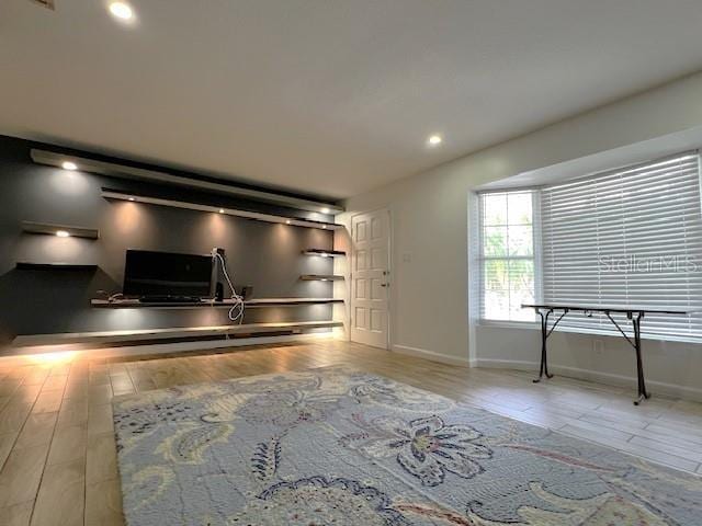 9148 Oakwood Dr, Lake Wales, FL 33898 - kitchen with wood finished floors and recessed lighting