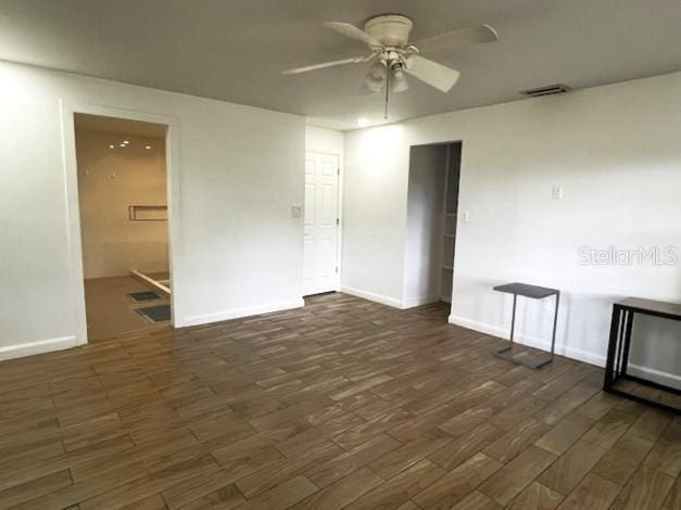 9148 Oakwood Dr, Lake Wales, FL 33898 - unfurnished room featuring wood finished floors and a ceiling fan