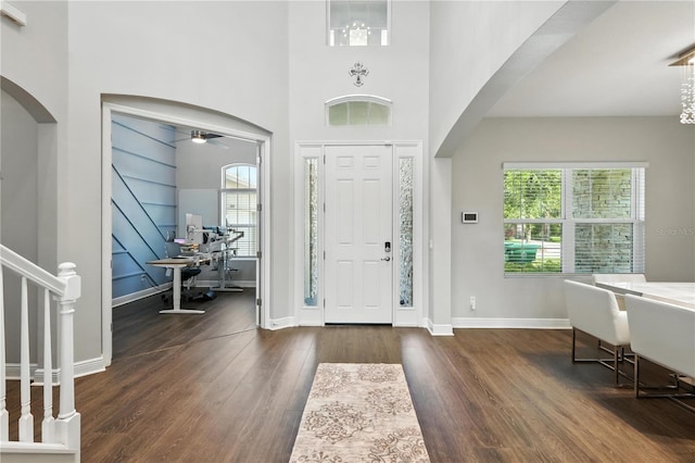 13924 Jomatt Loop, Winter Garden, FL 34787 - foyer with arched walkways, plenty of natural light, wood finished floors, and a ceiling fan