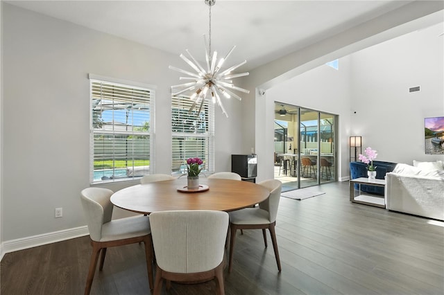 13924 Jomatt Loop, Winter Garden, FL 34787 - dining space with a chandelier and wood finished floors