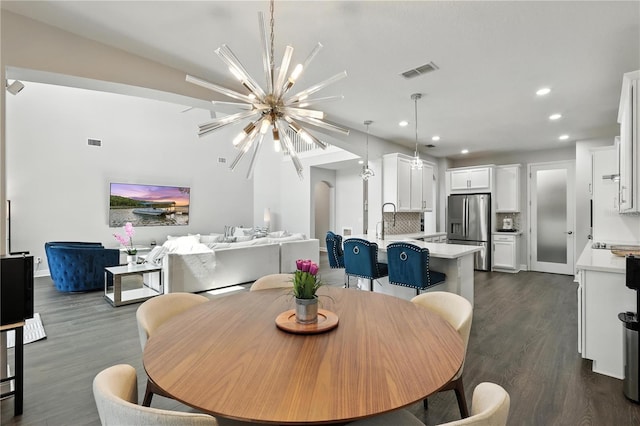 13924 Jomatt Loop, Winter Garden, FL 34787 - dining space featuring a chandelier, dark wood-style floors, and recessed lighting
