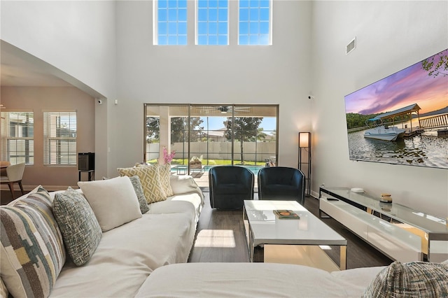 13924 Jomatt Loop, Winter Garden, FL 34787 - living room with a high ceiling and wood finished floors