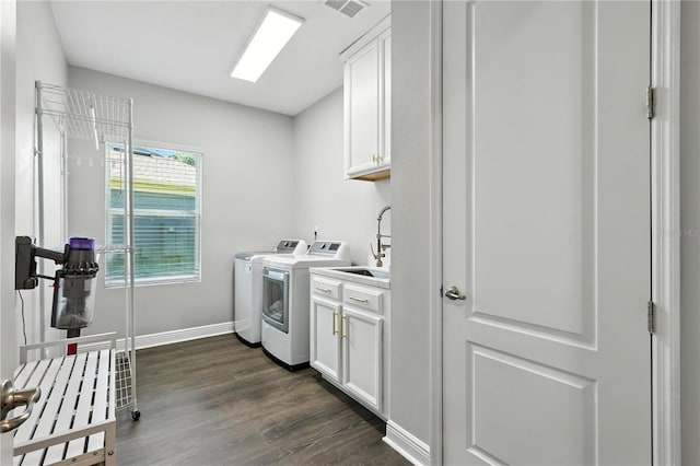 13924 Jomatt Loop, Winter Garden, FL 34787 - laundry room featuring washer and dryer, cabinet space, and dark wood-style floors