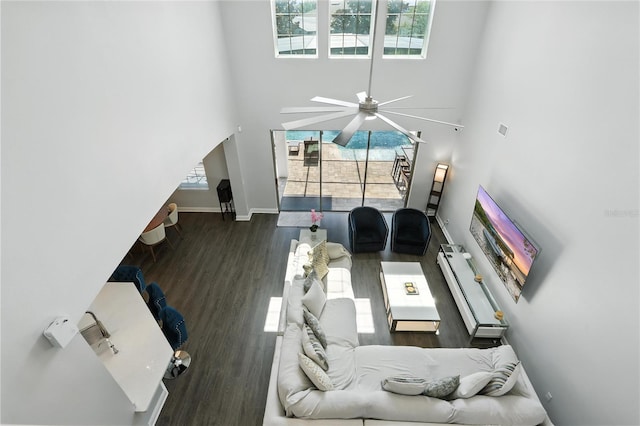 13924 Jomatt Loop, Winter Garden, FL 34787 - living area with wood finished floors, ceiling fan, and a towering ceiling